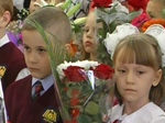 Белые банты и осенние букеты